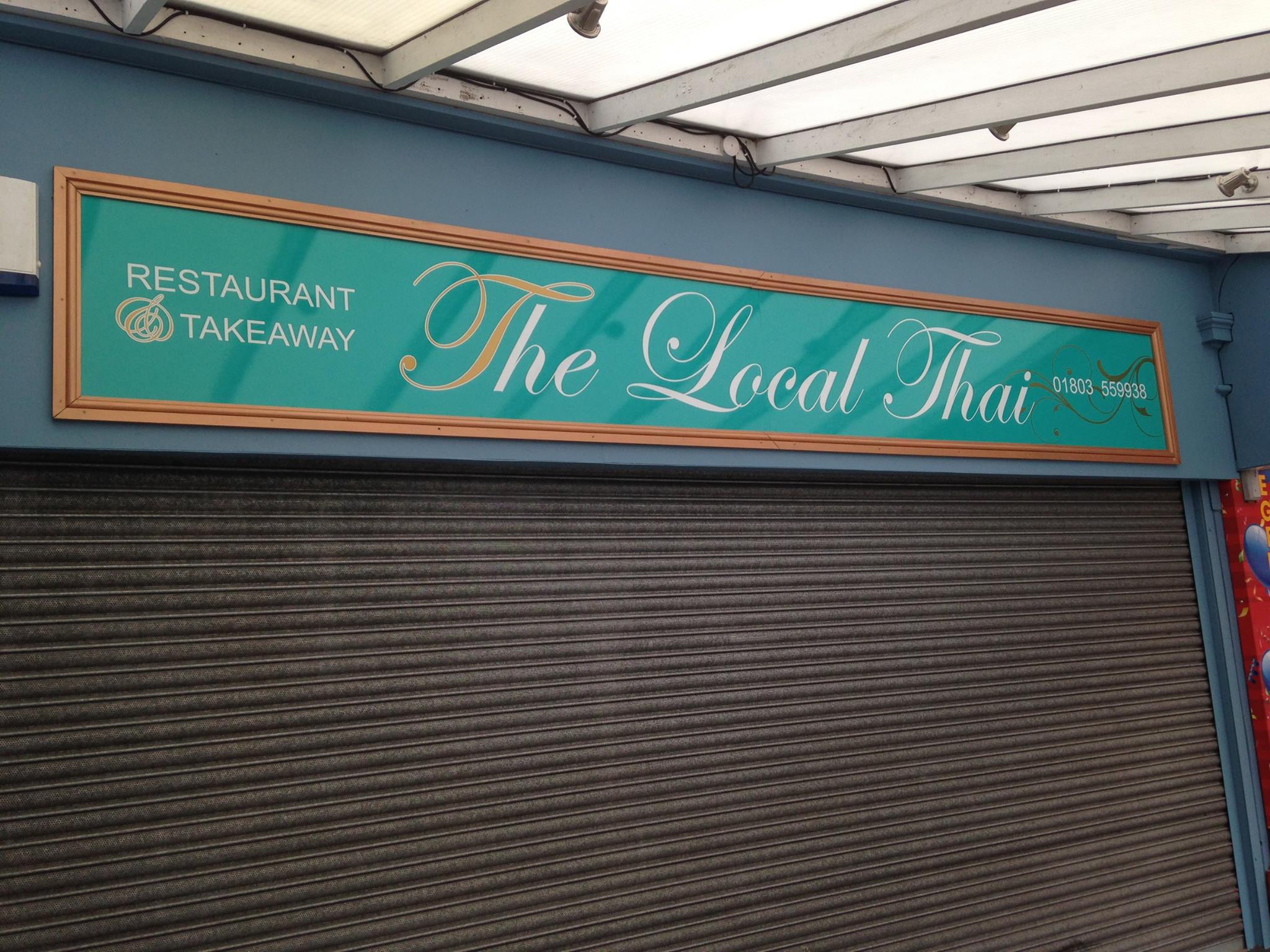 Restaurant signs in Paignton